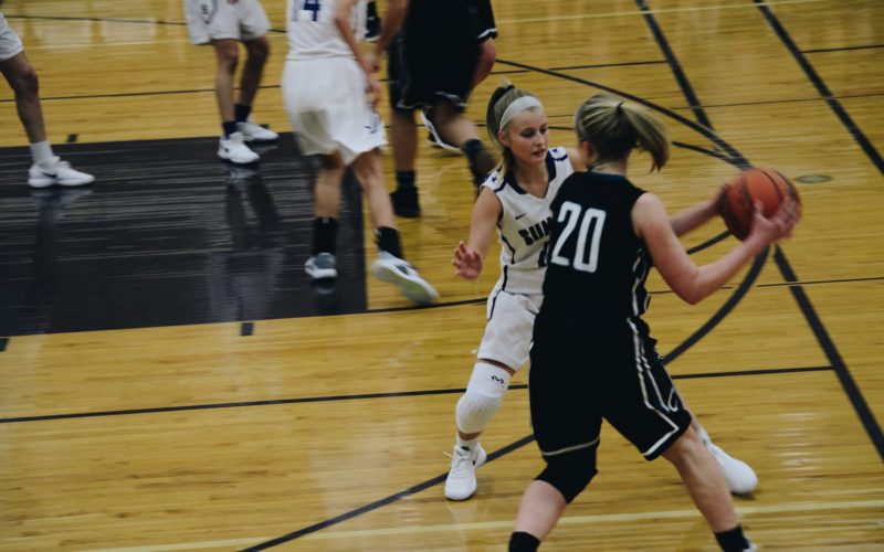 photo of women playing basketball